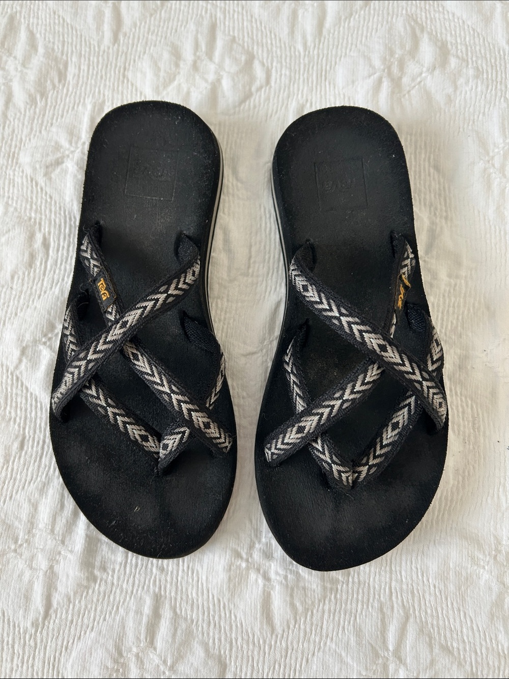 Teva Black Slide Sandals with Black and White Chevron Straps, Size 5.